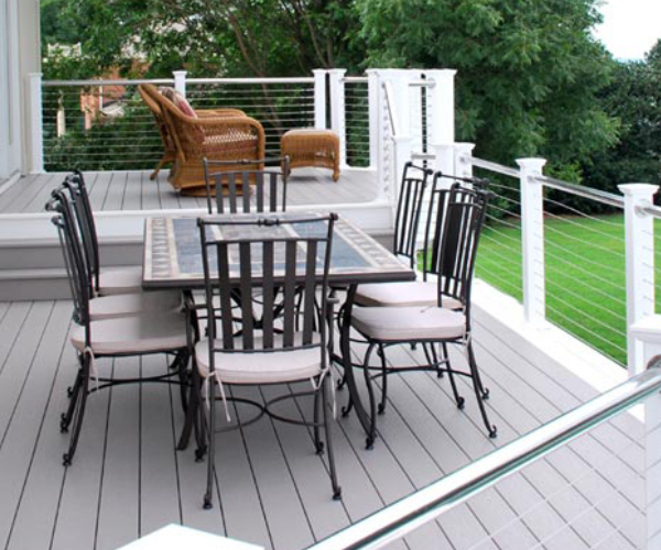 An Image Of Terrace Houses Having Extended Family Casual Sining With Metal Railings.